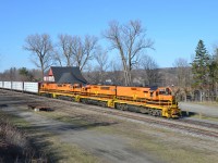 St Lawrence & Atlantic Train 394 passes the former CN station at Coaticook, QC