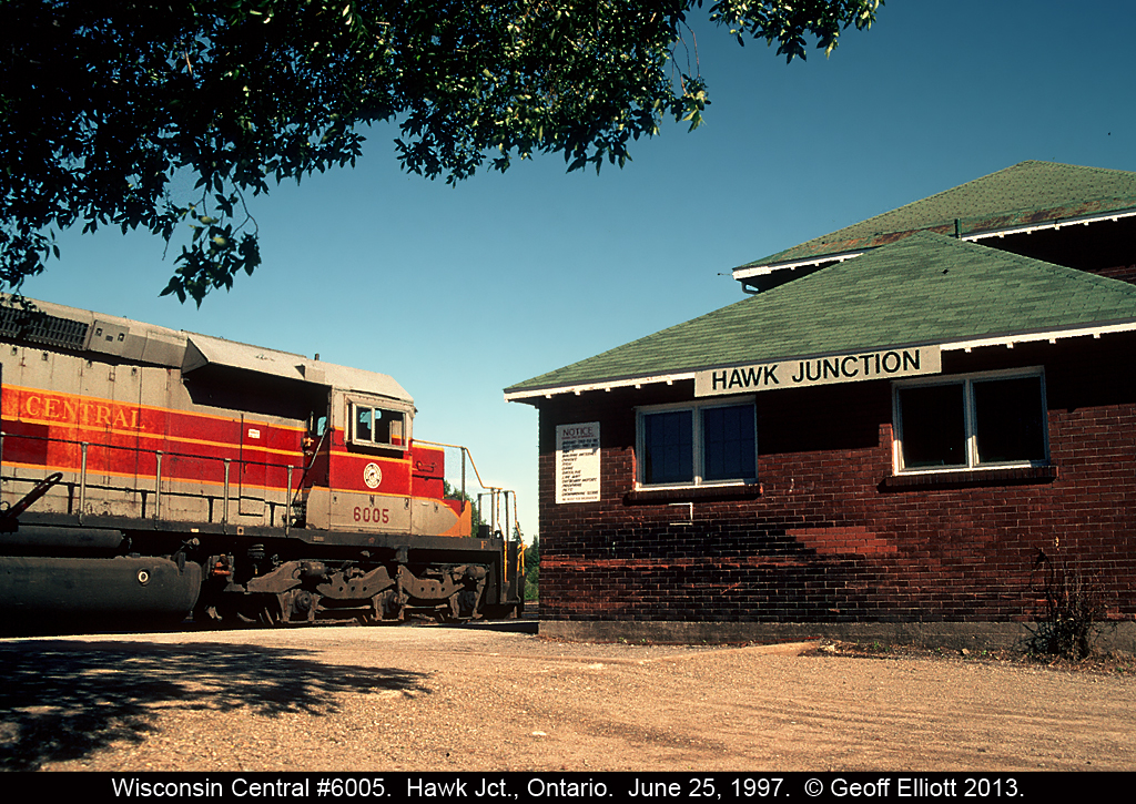 If not for the number on the SD40-2 this could have been taken back in the late 70's or 80's, but alas, the number is a tell tail that means this is now a Wisconsin Central unit.  Here WC SD40-2 #6005 pauses for a crew change at the depot in Hawk Junction back in June of 1997.