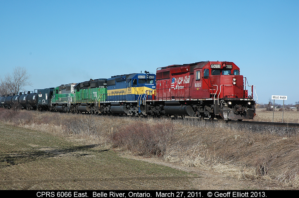CPRS SD40-2 #6066 commands an eastbound ethanol train with a colorful mix-mash of paint schemes for power leading the way.