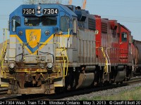 The crew of train T-24, with D&H 7304 and CP 7307 running as light power, have finished adding their EOT to the tail end of their lift at the west end of Walkerville siding.  Once tied on 7304 will lead T-24 to the U.S. to make it's connections.