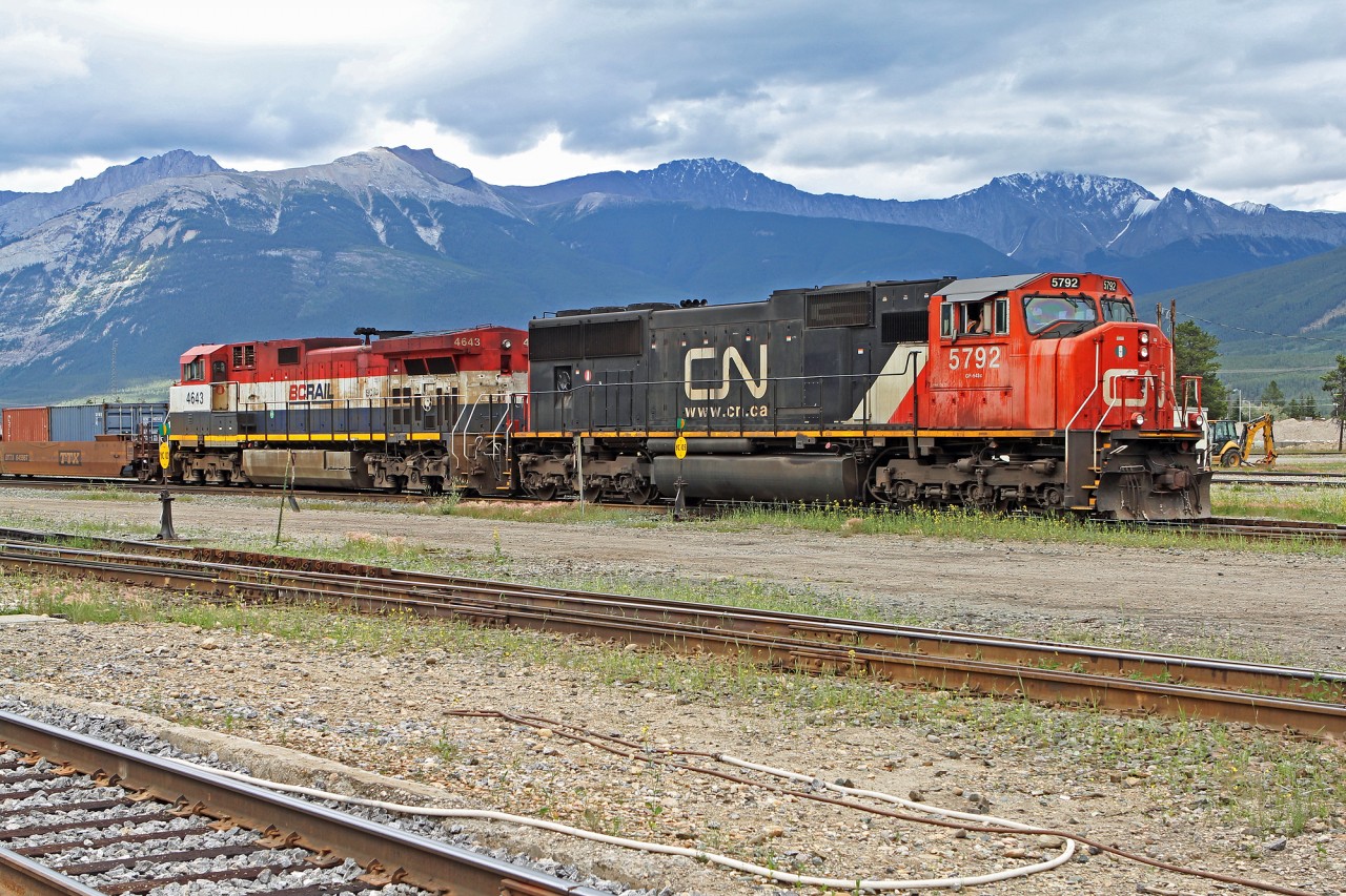 SD 75I CN 5792 and BCOL Dash 9-44CW sit in Jasper Yard waiting to depart with a westbound train.  (This picture taken by my son Jason)