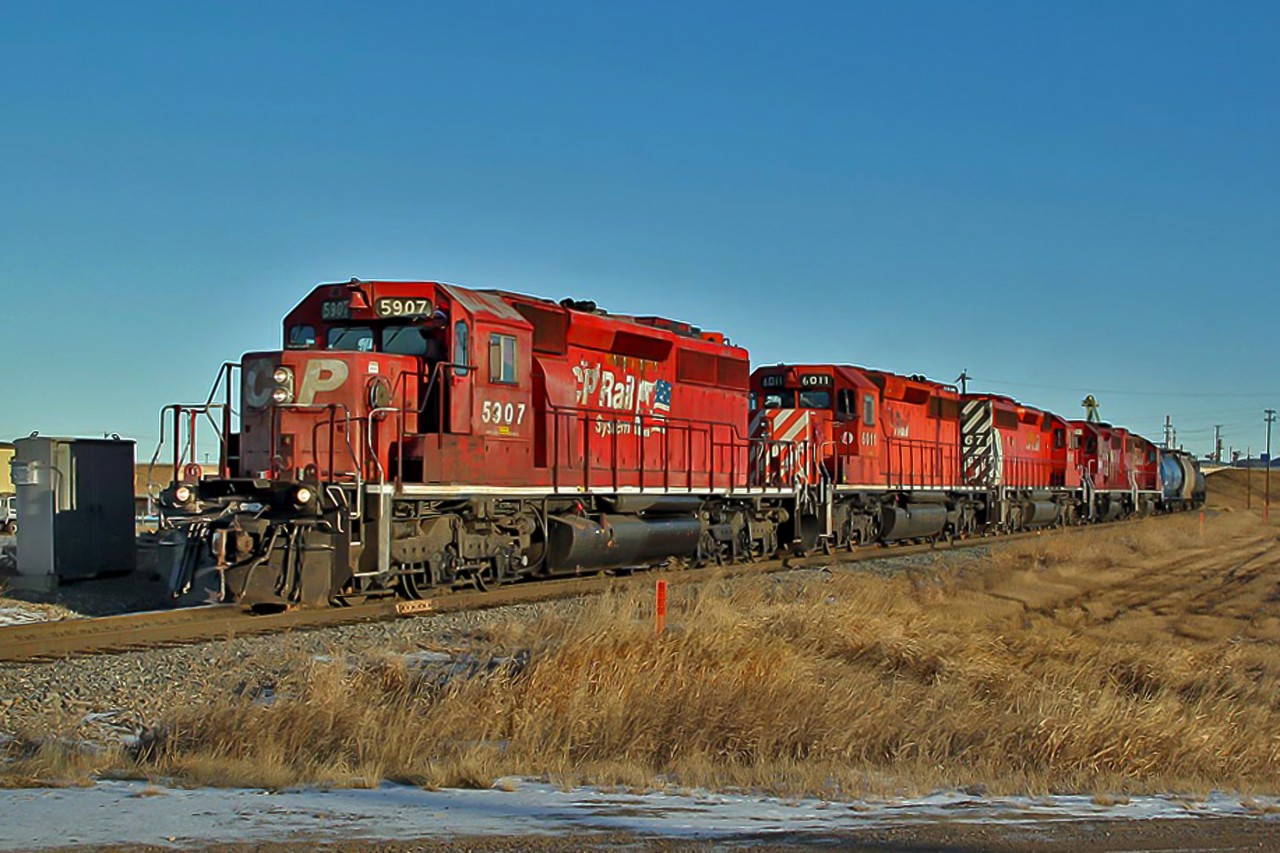 Heading south on the Scotford Sub quite the lash up, SD40-2's CP 5907, 6011, 6067 and GP38-2's CP 3081 and 3023.  Given the date maybe they were all "heading home for the holidays".
