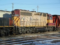 A closer look at WC 3026 in Map paint scheme.  3026 was painted with the map and statement " 150 years of Rolling" to celebrate the 150 years of Statehood for Wisconsin. The shield celebrate the 10th anniversary of Wisconsin Central--"Our Rail Heritage". 