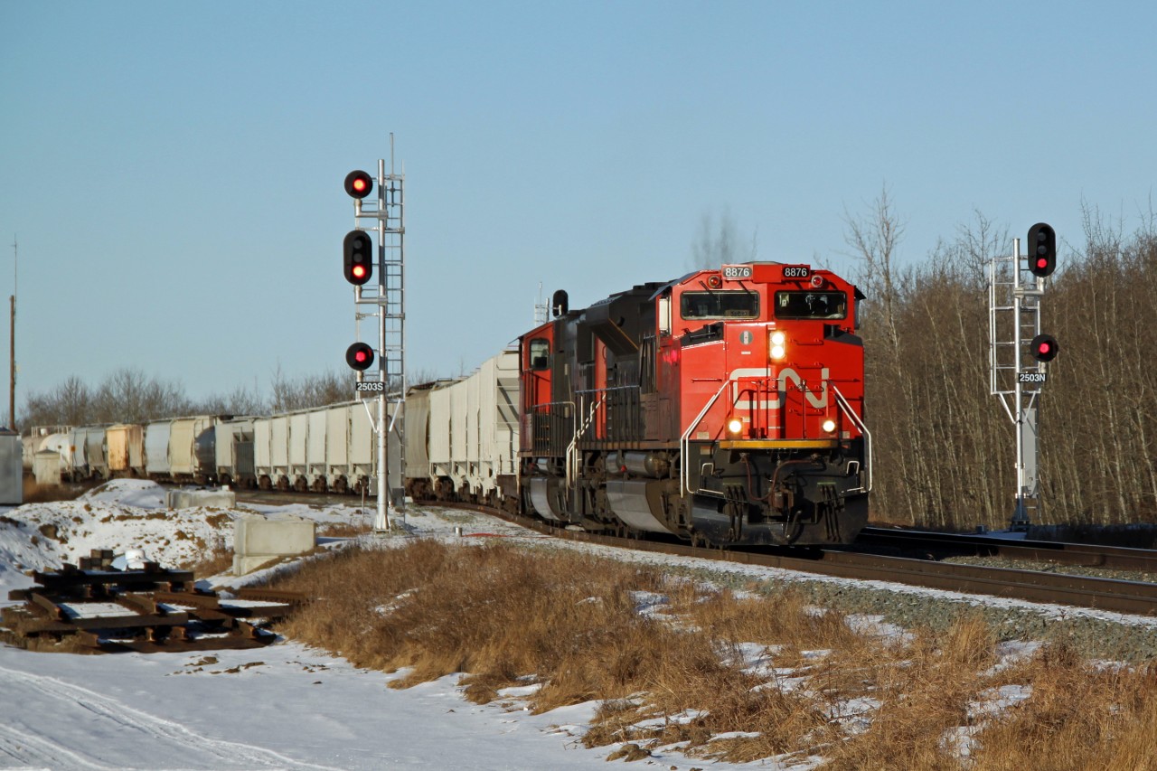 SD70M-2 CN 8876 and SD70I CN 5611 heading east take the new switch onto the second main line at Ardrossan