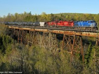 CP 609 glides across Duffin's Creek behind CEFX 1018, CP 8816 and CP 9509 on the home stretch to Agincourt and a crew change. In moments they'll knock down the Home signal at the west end of Cherrywood, the last siding on the west end of the Belleville Sub. 1836hrs.