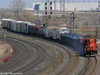 Almost looks like an un-rebuilt GP9 is powering this train... almost. CN 7075 and 7082 with 571's Belleville-Mac Yard train work the yard at Oshawa. 1421hrs.