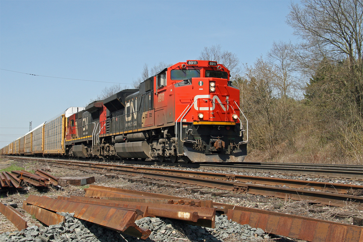 CN 148 has quite a lot of general merchandise on the head end this first day of May 2013 at Copetown, ON.  
About 1/3 of the way back, the double stacks, more indicative of Q-148, will reveal the train's identity.