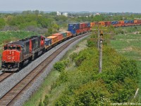 "Don't call me old". A 38 year old CN 9531 leads a somewhat younger CN 5751 on train 149 at Bowmanville, Ontario. 1415hrs.