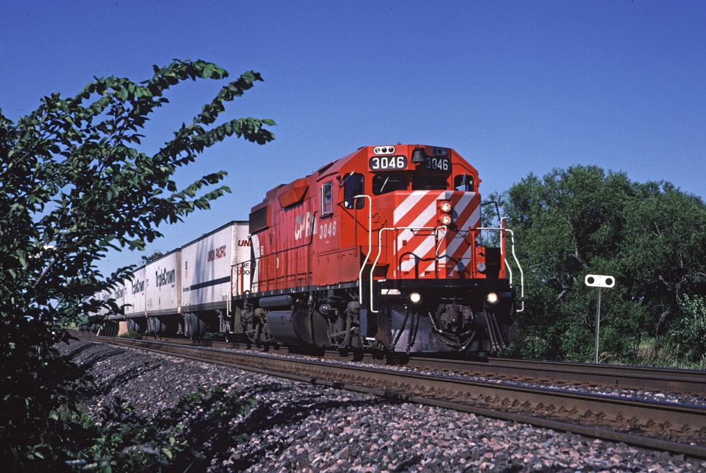 Another shot of GP38-2 3046 leading #529 climbing out of the Hornby Dip, approaching 5th Line.