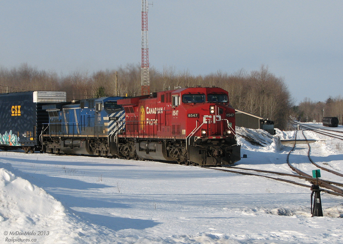 Coming off the Hamilton Subdivision from Hamilton (where else?) CP 8547 and CEFX "Bluebird" 1046 roll #427 into Guelph Junction on the connection track for the Galt Sub (shown on right) bound for Toronto.