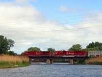 After waiting in the siding at Belle River for 240 and T76, CP 8793 and INRD 9013 get under way for the border with train 609 at mile 94.3 on the CP's Windsor Sub.