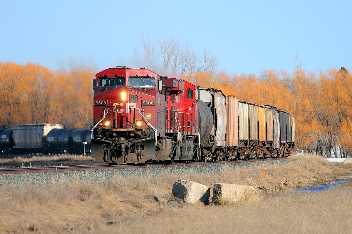 CP 9608 departs Portage and heads west towards Minnedosa.