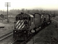 CP #4731 and 4738, M-636, switching off a work train at Coldwell, Ontario, mile 74.7 of CP's Heron Bay Subdivision.