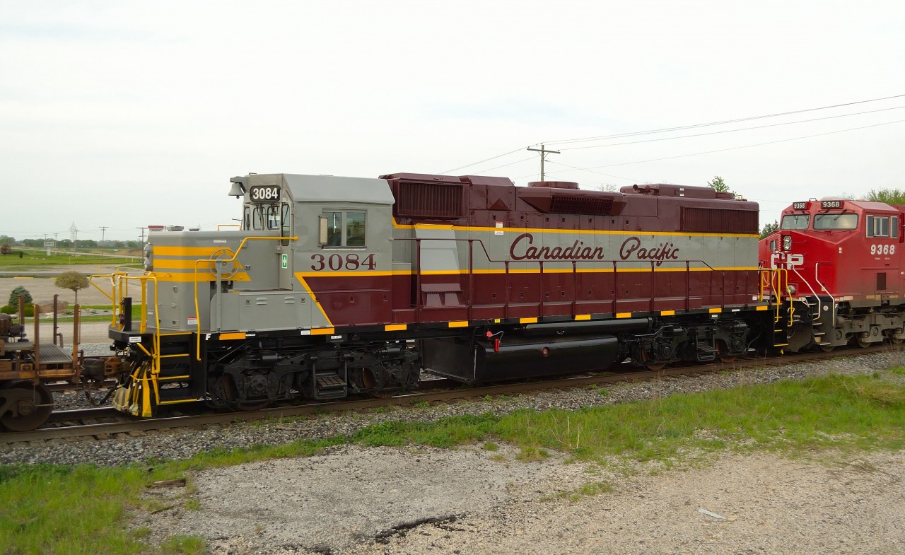 After getting a rebuild and receiving a fresh coat of paint in its heritage colours, CP 3084 trails on CP 240 as it passes eastbound thru Tilbury.
