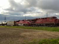 CP 609 led by CP 8793 & INDR 9013 heads westbound thru Haycroft with 100 crude oil empties. The INDR loco came across the border on an eastbound 242 about 8 hours prior and got shuffled onto this train in London.