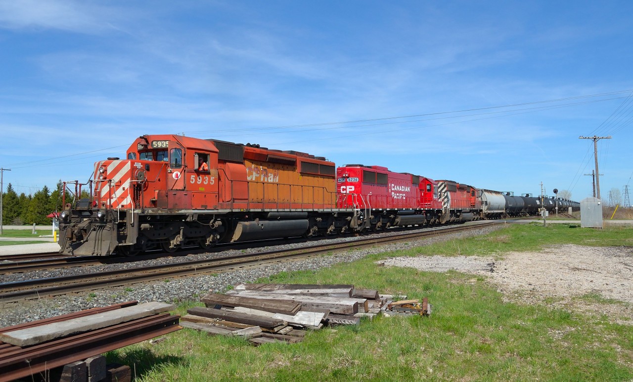 CP 641 sporting all EMD for power, pulls into the siding in Tilbury to clear the way for an oncoming 142.