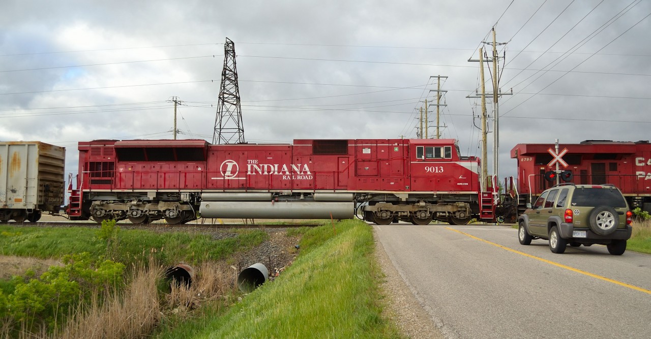INDR 9013, an SD9043MAC makes a rare appearance this side of the border trailing on CP 609 headed westbound towards Walkerville. This loco crossed the border about 8 hours prior on an eastbound 242 and got shuffled onto this train in London.