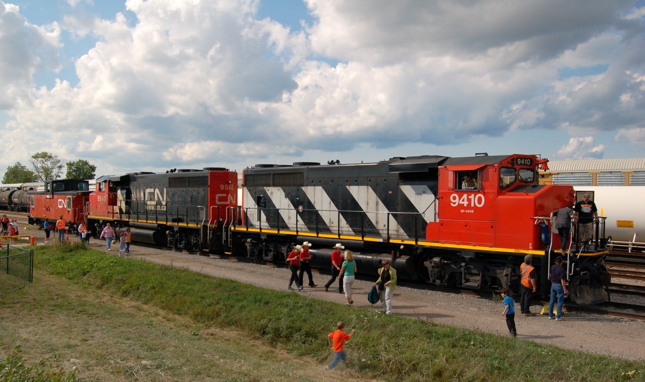 9410 and 9542 have the Sarnia based CN caboose in tow for Safety/Family Day at Sarnia yard.