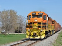 Westbound QG freight on the Lachute Sub under clear skies and summer-like temperatures.