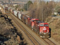 AC4400CWs 9642 and 9592 cross over from the south to the north main as they lead an empty grain train eastbound from Kamloops.