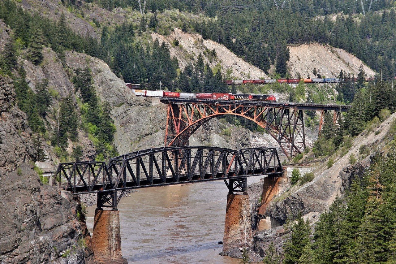 CN 2599 and 5559 lead Edmonton to Vancouver train 417 over CP Rail's Thompson Sub and the Fraser River at Cisco, BC.
