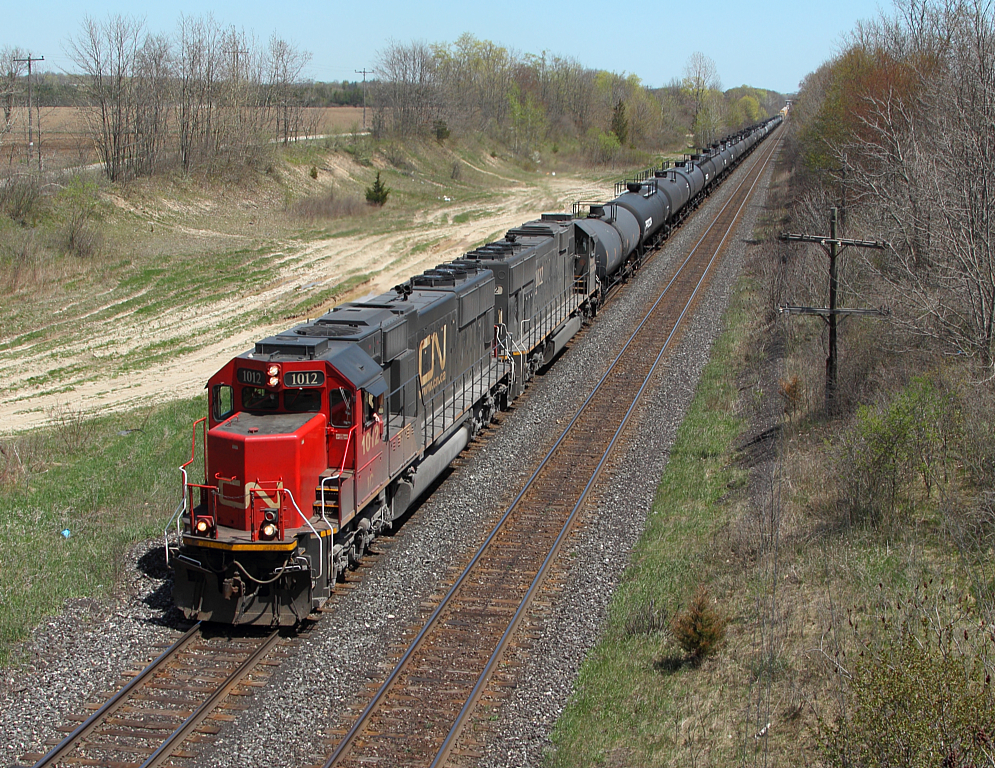 A pair of IC SD70 lead CN 331 out of Paris. It's not everyday that you see a pair of standard cab SD70s as sole power on a train, especially in Canada.