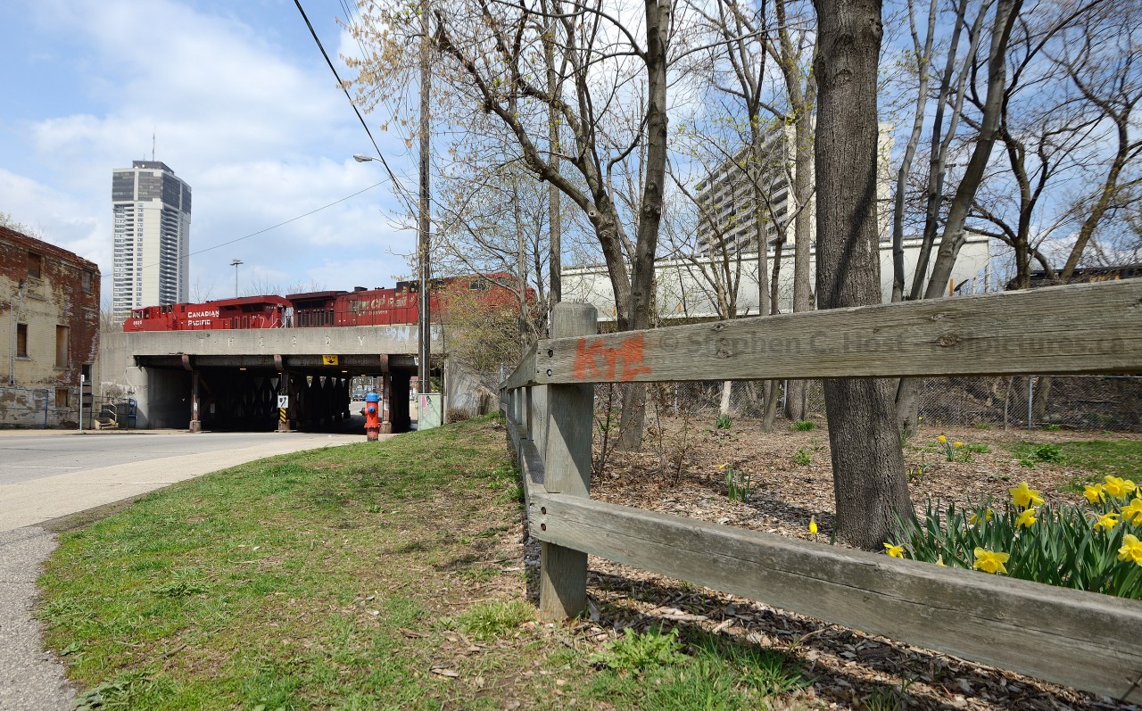 Shamrock Park in Corktown is the location of this scene as train 255 has entered the CTC and is about to pass the former TH&B GO Station.