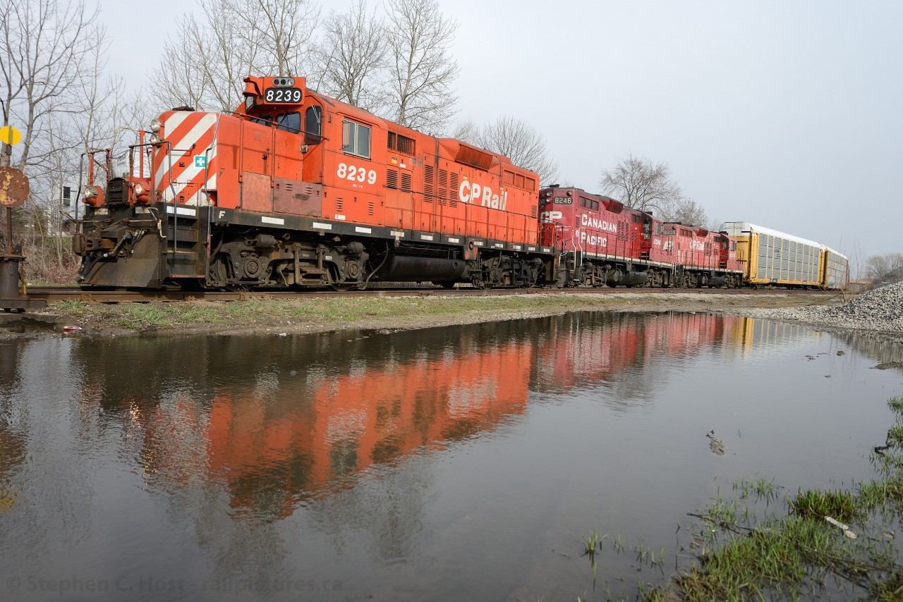 Parkway is the last Mileboard on the CPR Waterloo subdivision and the middle of this train straddles the sign. Parkway is also the name of the town that once had autonomy here when this section of the CPR Waterloo Subdivision was built in 1961. In 1961 electric operations ended when the re-alignment (about three miles) of the former Grand River Railway was put into service to meet the CNR Waterloo Subdivision. A yard, now used for interchange between CNR/CPR sits here and this is the point Toyota autoracks from 431/2 are handed off.