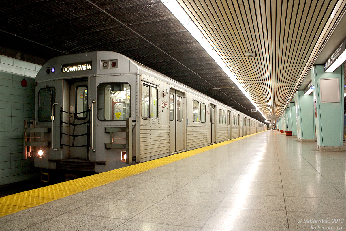 TTC 5165 leads a set of T1 subway cars, southbound at York Mills Station on the northern section of the Yonge line.