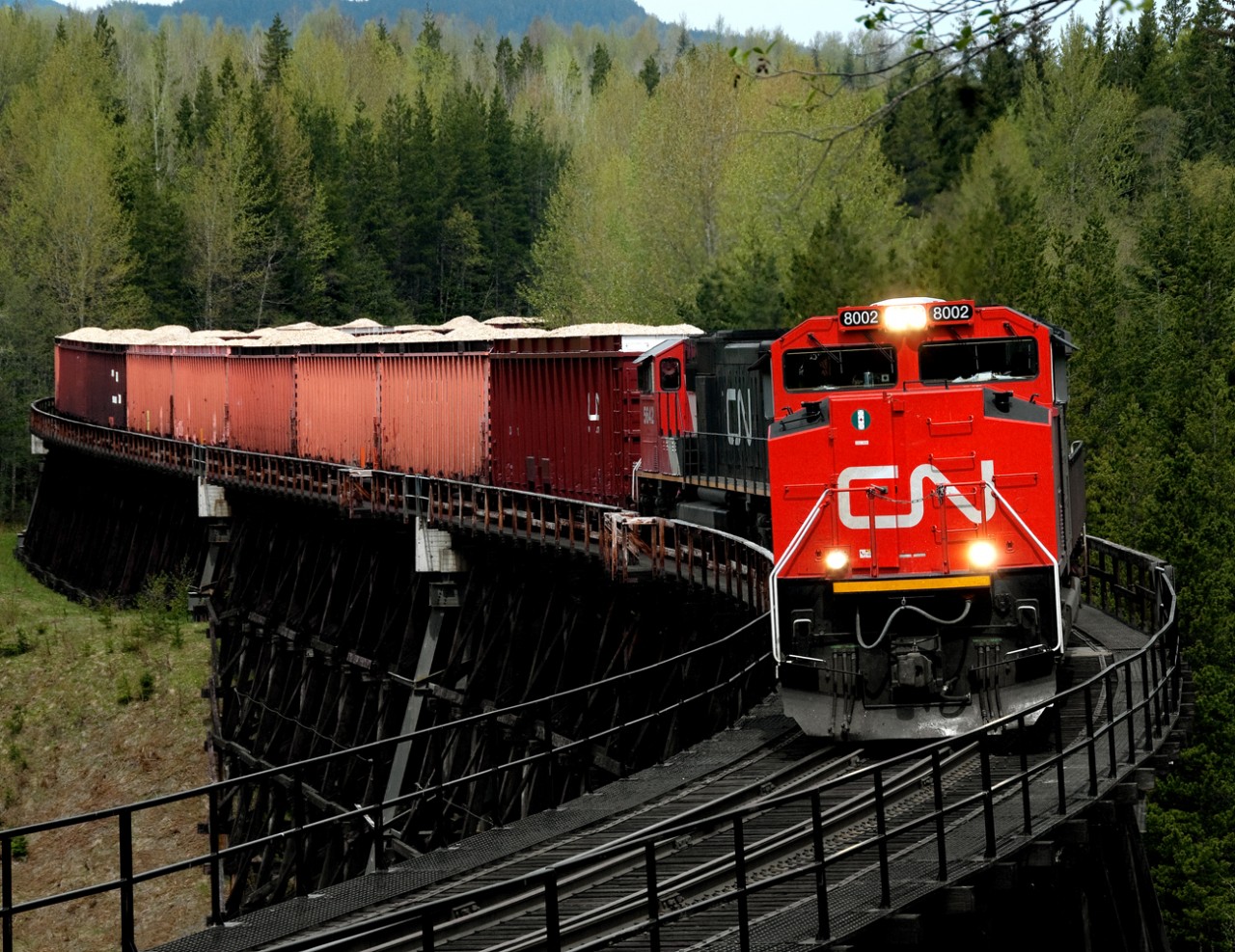 The CN Terrace to Kitimat turn southbound out of Terraceon the curved Thunderbird trestle.