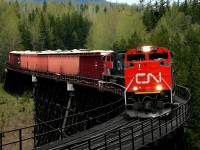 The CN Terrace to Kitimat turn southbound out of Terraceon the curved Thunderbird trestle.