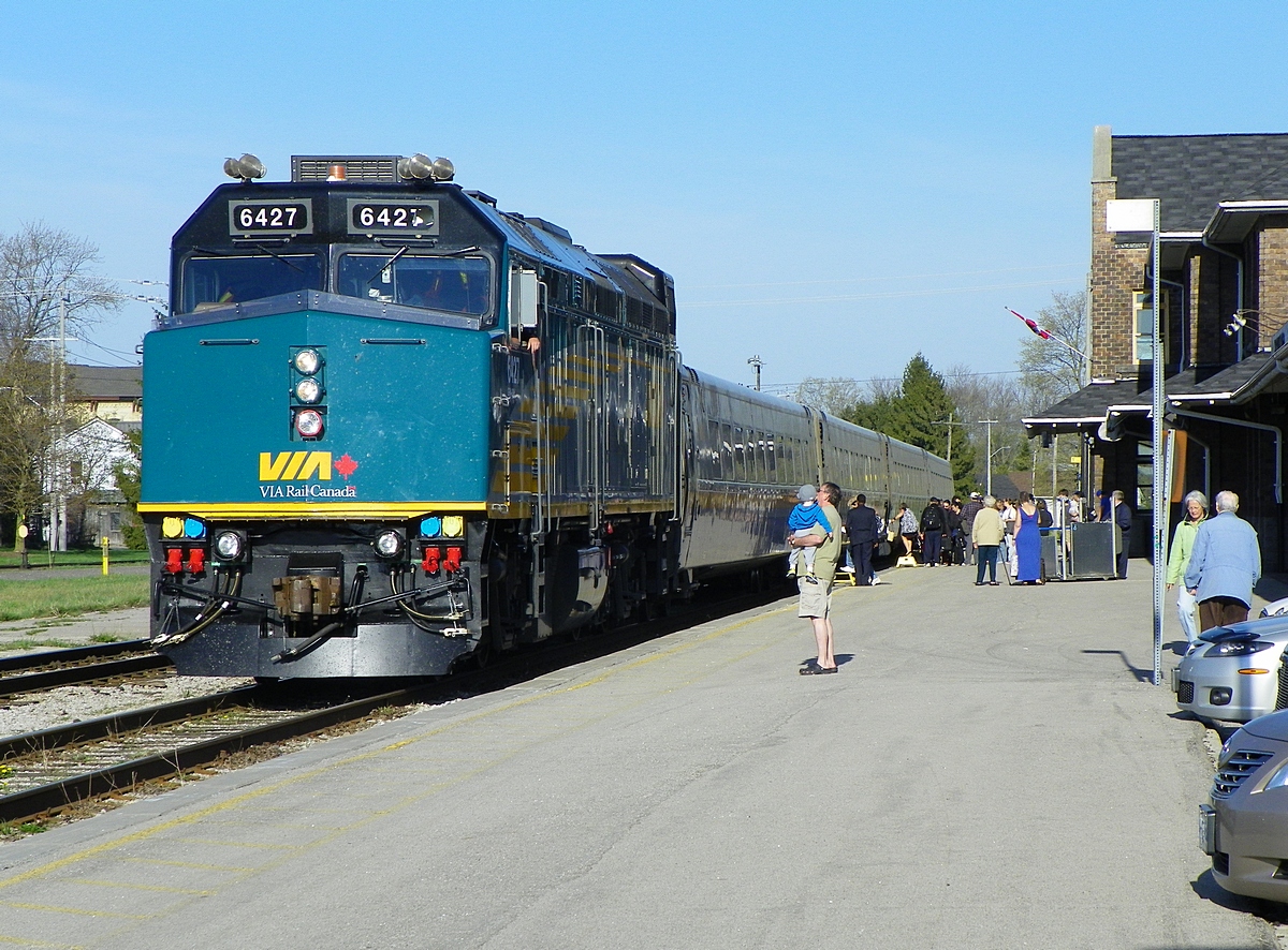 VIA (F40PH-3)6427 at Stratford ON 8.30am Saturday, May 4th 2013.  VIA engineer in foreground 'Jamie McCardle' with his grandson 'Lucas'...starting 'em early - railfanning.
