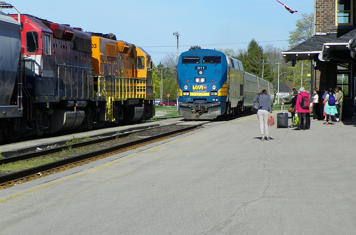 Splash of orange - as VIA (P42DC)911 arrives at Stratford Ontario. 8:30am Monday, May 6th 2013. f5.0 x 129mm.
QGRY 2303, RLK 4095 trailing forty-two cars holding as wb for Goderich, cleared at 9am.