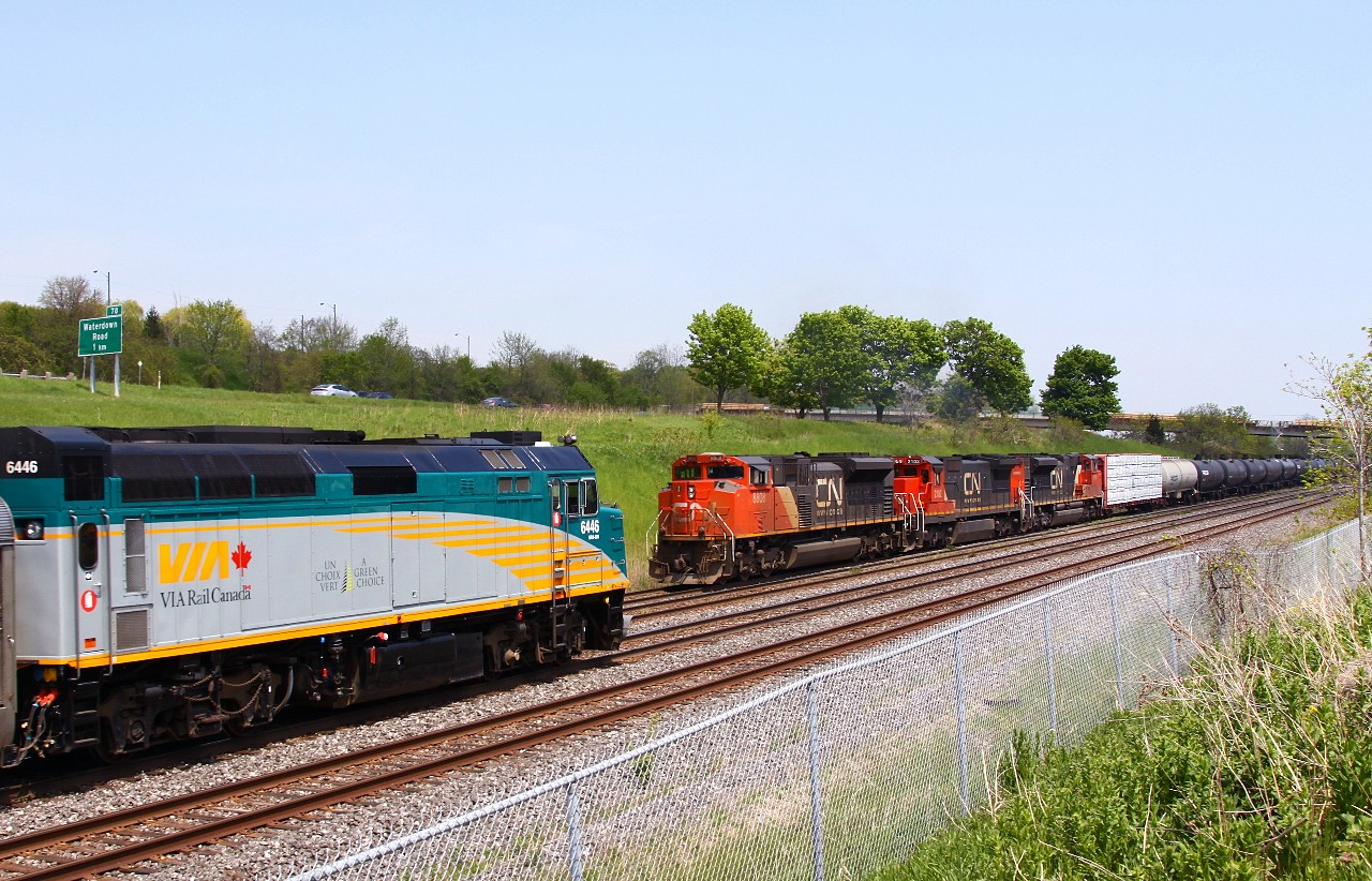 VIA 73 scoops a very early CN 435 as they pull down the yard lead to Snake. On Sundays, VIA 73 normally hauls the next morning's 82 equipment set to London, however on long weekends it goes down on the Monday. Today's CN 435 had 57 loads of Saskatchewan light crude oil on the head end that would be set off at Brantford for SOR to bring to the IOL Nanticoke refinery.