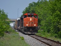 CN 439 just pulled off the CP Windsor Sub, and heading down the CN Pelton Spur. The Train is rocking back and forth over some old Switches that are sinking a little. The crew is getting bounced around a little, but also know not to blow the horn full blast as we are in City limits and people complain. 