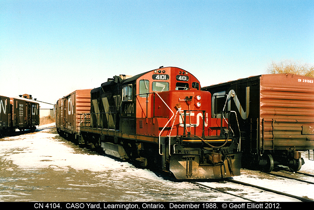 Shortly after CN 4424 left the property CN 4104 took over the duties of hauling Heinz business.  Here sits a 'chopped' sister to 4424 at the south end of Leamington Yard in December of 1988.