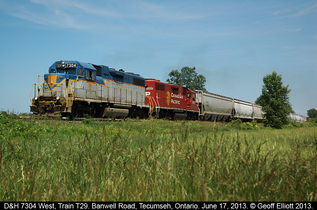 Train T-29 returns to Windsor with 25+ cars after a day of switching industries around the Chatham area.  Big train today and the crew said they were able to get all of their work done for a change.