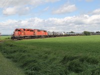 SD40-2 CP 5976 and 40-2F "Red Barn" 9021 continue their journey south approaching the RR223 grade crossing at MP 155.