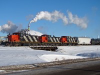 GMD1's CN 1421, 1409 and 1433 do some winter time switching in Fort Saskatchewan