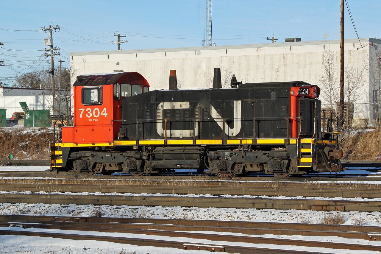 SW1200RM CN 7304 rests in Walker Yard, Edmonton.