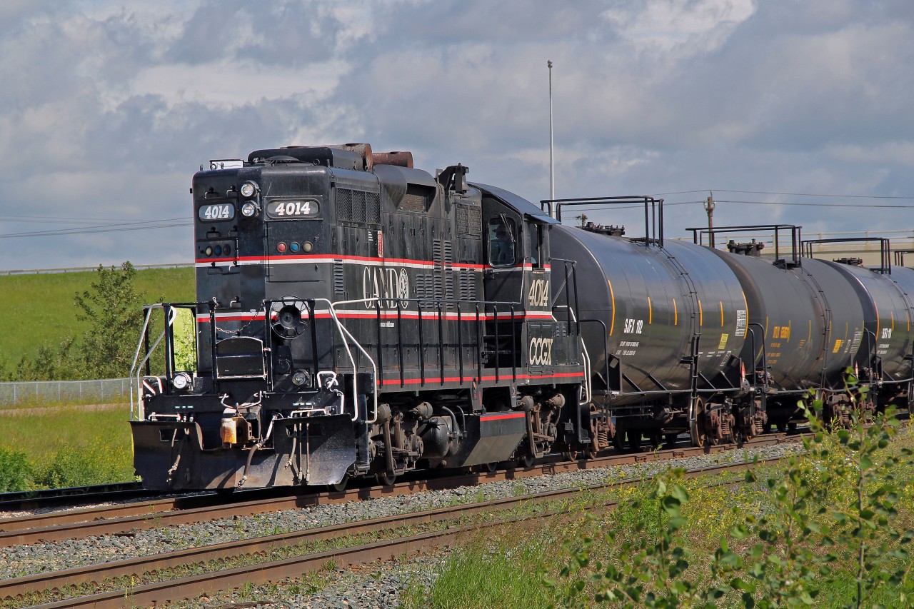 CANDO's GP9RM 4014 prepares to make the short 7 mile journey south with tank cars from the Strathcona ESSO Refinery to be deposited at the storage sidings near Tilley.