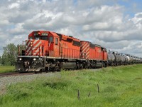 SD40-2 CP 5976 and 40-2F "Red Barn" 9021 are seen at Josephburg heading a short rake of tank cars south from Elk Island to Clover Bar on CP's Scotford Sub.