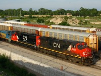 After pulling into Aldershot and making a set off 399 backs down towards the yard office to receive further orders. 2633 is paired with a rather clean looking 5423, and dead in transit is one of 4 ex-Port of Montreal MP 15, now GMTX 304 on its way to Illinois.