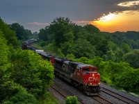 0620: The second 'longest day' starts early at Bayview Junction for the annual railfan meet, here CN 421 is seen heading towards the Grimsby Sub with freight for Ft. Erie, ON.