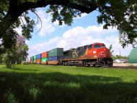 An eastbound intermodal heads through Oakville.