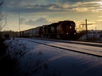 As a Winter day comes to a close, a trio of EMD products are about to throttle up with train 242 after working the OSR Yard at Guelph Junction.