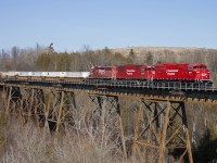 With the recent news of the CP SD60's being stored and put up for sale, I figured I would upload my favourite shot of one. Here's 6258, fresh out of CAD on it's only run through Ontario, over the Cherrywood trestle.