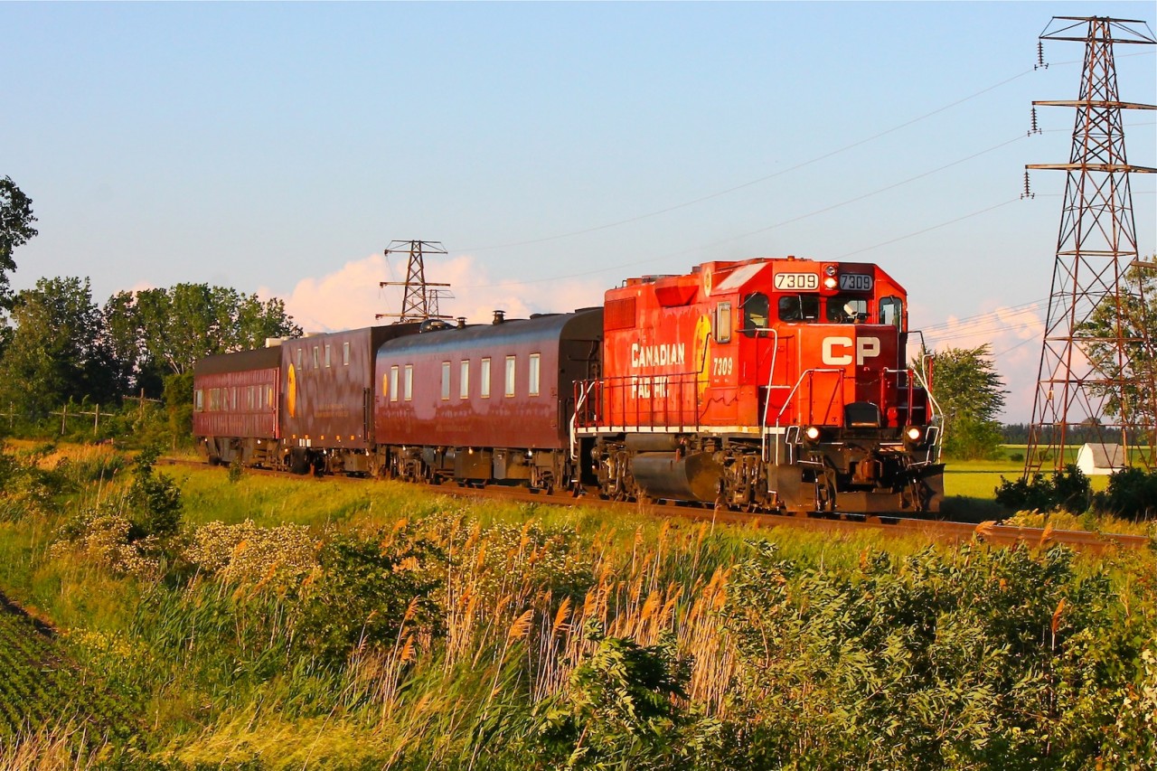 WOW! You don't see this everyday! CP's track evaluation/geometry/tech train thunders Westbound on CP's Windsor Subdivision with clearance to Walkerville. You'll note ex D&H 7309 has a video camera mounted to the short hood for the occasion, with what might possibly be the classiest paint scheme to ever adorn passenger cars on the trailing evaluation equipment. CP has always had some sharp looking trains and when you see these beautiful vintage cars on the mainline it's hard not to imagine a time when CP still hauled passenger.