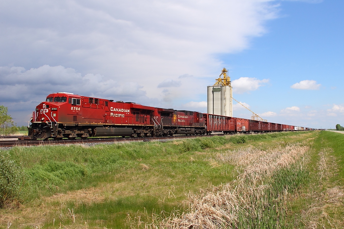 CP's 299 departs the Winnipeg area for points west and some rather stormy weather.