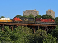 CP 9590 and CN 5705 roll 241's train high above the West Don River at Leaside. Urban railfanning is not my thing, but I wanted this guy in sun and was foiled at Cherrywood, so I ventured into the land of traffic and no parking. Thanks for the heads-up Cam. 1942hrs.